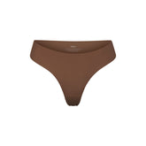 NAKED DIPPED THONG | JASPER (THONGS, PANTIES) LAYS FLAT ON A WHITE BACKGROUND | FLT
