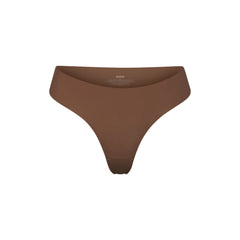 NAKED DIPPED THONG | JASPER (THONGS, PANTIES) LAYS FLAT ON A WHITE BACKGROUND | FLT