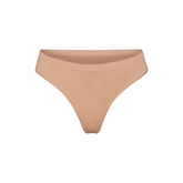 SOFT SMOOTHING SEAMLESS THONG | OCHRE (THONGS, PANTIES) LAYS FLAT ON A WHITE BACKGROUND | FLT