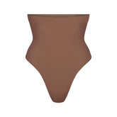 SEAMLESS SCULPT HIGH-WAISTED THONG | JASPER (SHAPEWEAR THONGS, PANTIES) LAYS FLAT ON A WHITE BACKGROUND | FLT