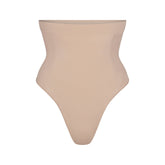 SEAMLESS SCULPT HIGH-WAISTED THONG | MICA (SHAPEWEAR THONGS, PANTIES) LAYS FLAT ON A WHITE BACKGROUND | FLT