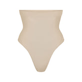 SEAMLESS SCULPT HIGH-WAISTED THONG | SAND (SHAPEWEAR THONGS, PANTIES) LAYS FLAT ON A WHITE BACKGROUND | FLT