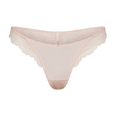 SKIMS LACE THONG | PRIMROSE FLAT ON A WHITE BACKGROUND | FLT