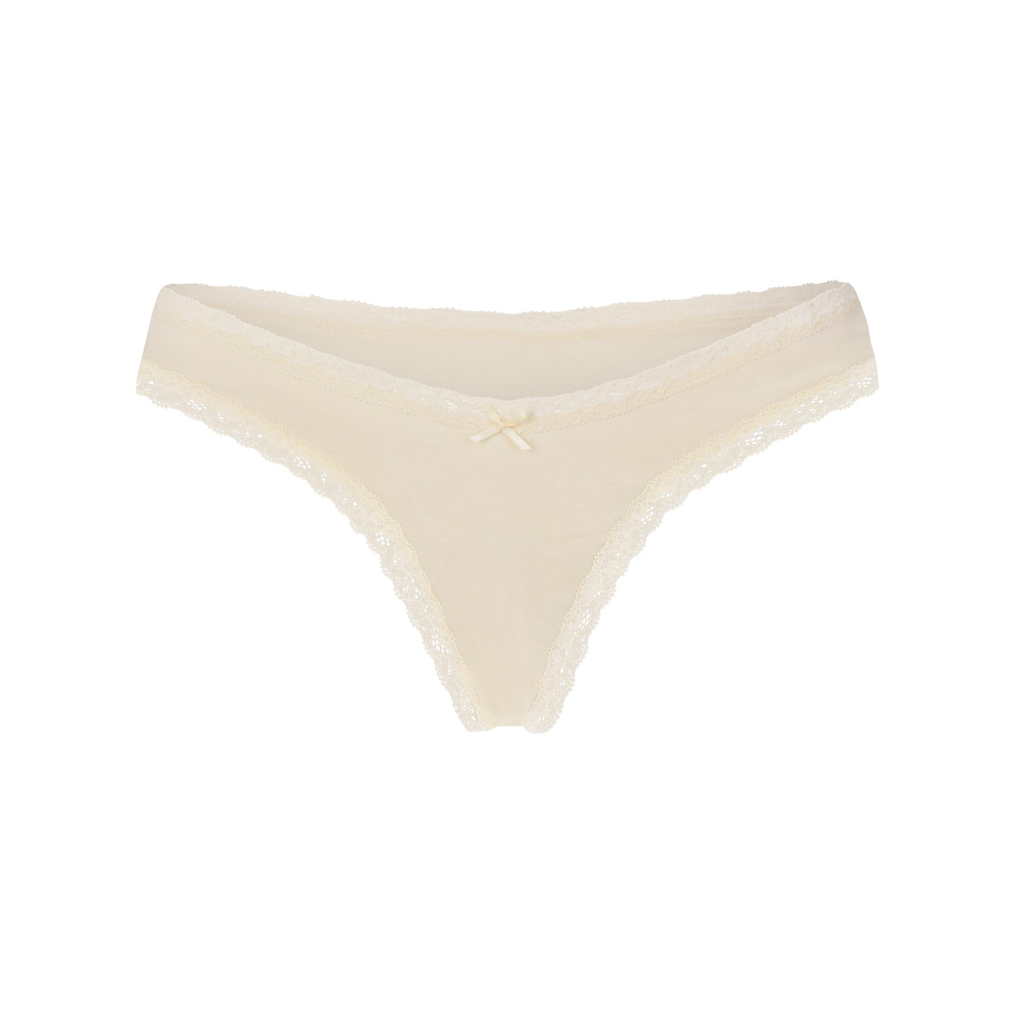 LIGHTWEIGHT COTTON LACE THONG | BUTTER TONAL FLAT ON A WHITE BACKGROUND @ | FLT