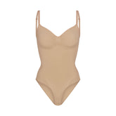SEAMLESS SCULPT BRIEF BODYSUIT | CLAY (SHAPEWEAR BODYSUITS) LAYS FLAT ON A WHITE BACKGROUND | FLT