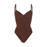 SEAMLESS SCULPT BRIEF BODYSUIT | COCOA (SHAPEWEAR BODYSUITS) LAYS FLAT ON A WHITE BACKGROUND | FLT