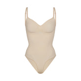 SEAMLESS SCULPT BRIEF BODYSUIT | SAND (SHAPEWEAR BODYSUITS) LAYS FLAT ON A WHITE BACKGROUND | FLT
