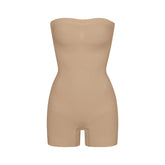 SEAMLESS SCULPT STRAPLESS SHORTIE BODYSUIT | CLAY (ONESIES, BODYSUITS) LAYS FLAT ON A WHITE BACKGROUND | FLT