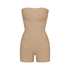 SEAMLESS SCULPT STRAPLESS SHORTIE BODYSUIT | CLAY (ONESIES, BODYSUITS) LAYS FLAT ON A WHITE BACKGROUND | FLT