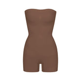 SEAMLESS SCULPT STRAPLESS SHORTIE BODYSUIT | JASPER (SHAPEWEAR BODYSUITS) LAYS FLAT ON A WHITE BACKGROUND | FLT
