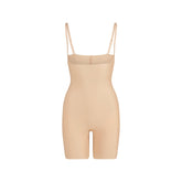 SKIMS BODY CORE SCULPT OPEN BUST MID THIGH BODYSUIT | CLAY FLAT ON A WHITE BACKGROUND | FLT