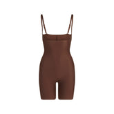 SKIMS BODY CORE SCULPT OPEN BUST MID THIGH BODYSUIT | COCOA FLAT ON A WHITE BACKGROUND | FLT