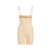 SKIMS BODY CORE SCULPT OPEN BUST MID THIGH BODYSUIT | SAND FLAT ON A WHITE BACKGROUND | FLT