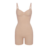 SEAMLESS SCULPT MID THIGH BODYSUIT | MICA (ONESIES, BODYSUITS) LAYS FLAT ON A WHITE BACKGROUND | FLT