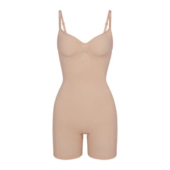 SEAMLESS SCULPT MID THIGH BODYSUIT | MICA (ONESIES, BODYSUITS) LAYS FLAT ON A WHITE BACKGROUND | FLT