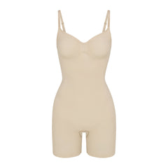SEAMLESS SCULPT MID THIGH BODYSUIT | SAND (ONESIES, BODYSUITS) LAYS FLAT ON A WHITE BACKGROUND | FLT