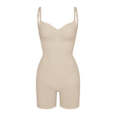 SEAMLESS SCULPT LOW BACK MID THIGH BODYSUIT | SAND (LOW BACK SHAPEWEAR, BODYSUITS) LAYS FLAT ON A WHITE BACKGROUND | FLT