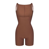 SKIMS BODY CORE SCULPT BACK SMOOTHING OPEN BUST MID THIGH BODYSUIT | JASPER FLAT ON A WHITE BACKGROUND | FLT