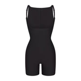SKIMS BODY CORE SCULPT BACK SMOOTHING OPEN BUST MID THIGH BODYSUIT | ONYX FLAT ON A WHITE BACKGROUND | FLT