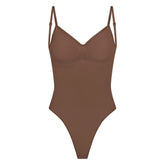 SEAMLESS SCULPT LOW BACK THONG BODYSUIT | JASPER (SHAPEWEAR BODYSUITS) LAYS FLAT ON A WHITE BACKGROUND | FLT