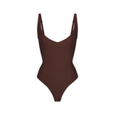 SKIMS BODY CORE SCULPT PLUNGE THONG BODYSUIT | COCOA (SHAPEWEAR BODYSUITS) FLAT ON A WHITE BACKGROUND | FLT