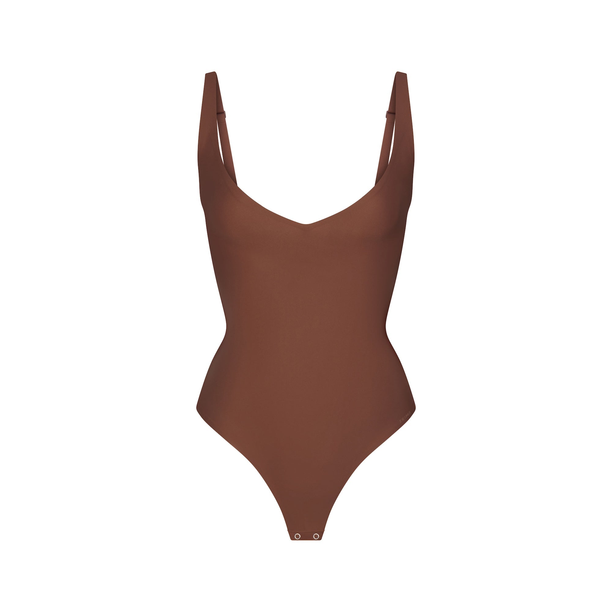 SKIMS BODY CORE SCULPT PLUNGE THONG BODYSUIT | JASPER (SHAPEWEAR BODYSUITS) FLAT ON A WHITE BACKGROUND | FLT