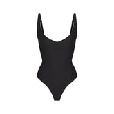 SKIMS BODY CORE SCULPT PLUNGE THONG BODYSUIT | ONYX (SHAPEWEAR BODYSUITS) FLAT ON A WHITE BACKGROUND | FLT