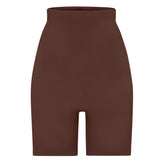 SEAMLESS SCULPT HIGH-WAISTED ABOVE THE KNEE SHORT | COCOA (SHAPEWEAR SHORTS, SHAPEWEAR) LAYS FLAT ON A WHITE BACKGROUND | FLT