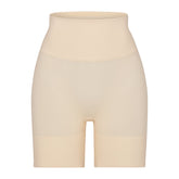 BUTT ENHANCING SHORT | SAND (SHAPEWEAR SHORTS, SHAPEWEAR) LAYS FLAT ON A WHITE BACKGROUND | FLT