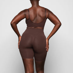 BUTT ENHANCING SHORT ON A MODEL BACK VIEW