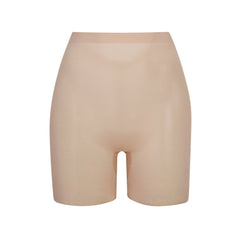 SHEER SCULPT LOW BACK SHORT | CLAY (LOW BACK SHAPEWEAR, SHAPEWEAR) LAYS FLAT ON A WHITE BACKGROUND | FLT