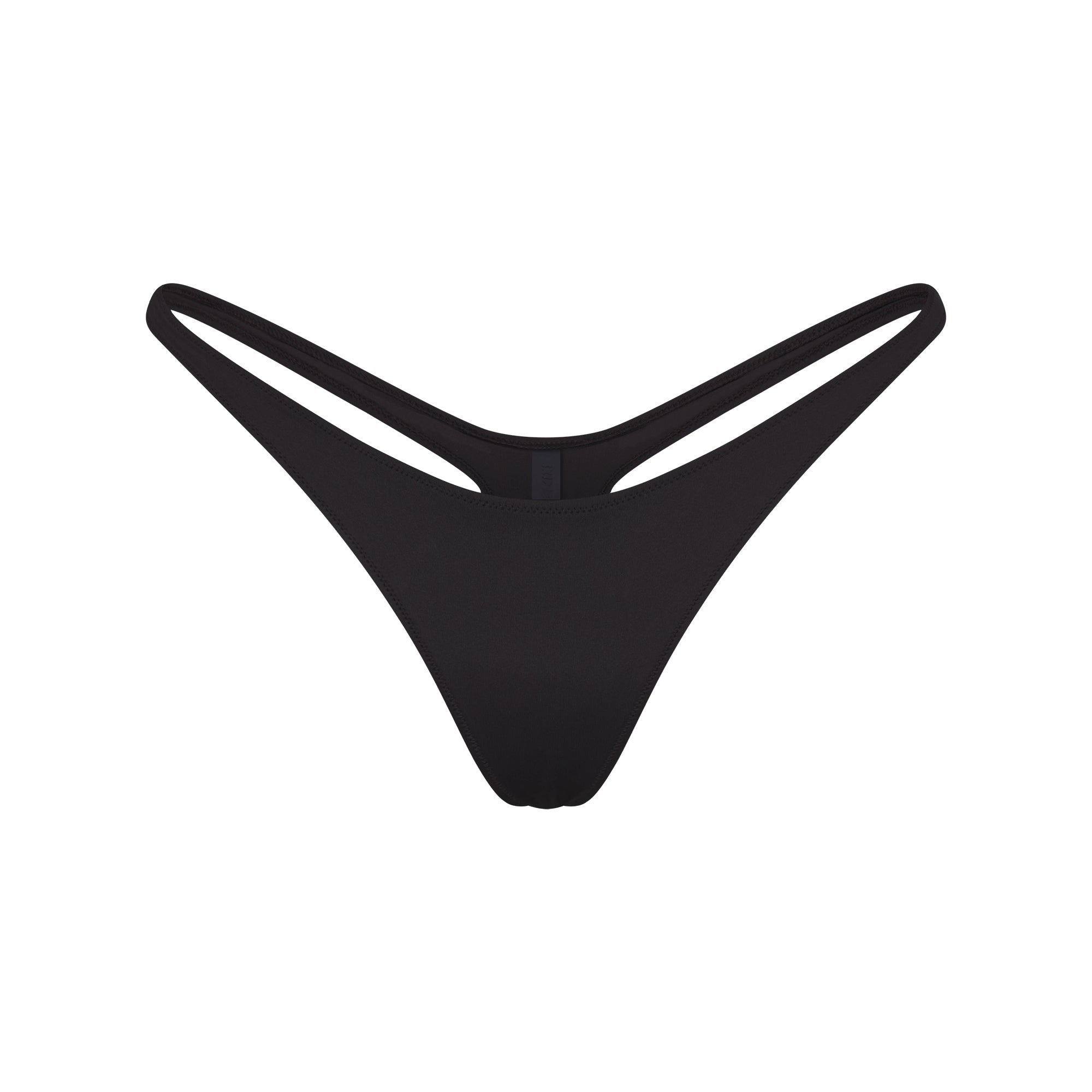 SIGNATURE SWIM THONG BIKINI BOTTOM | ONYX FLAT ON A WHITE BACKGROUND | FLT