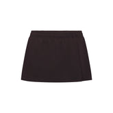 NikeSKIMS STRETCH NYLON SKORT | DARK ROAST & LAYS FLAT ON A WHITE BACKGROUND | FLT
