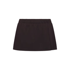 NikeSKIMS STRETCH NYLON SKORT | DARK ROAST & LAYS FLAT ON A WHITE BACKGROUND | FLT
