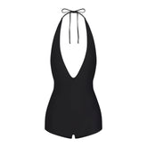 SIGNATURE SWIM PLUNGE SHORTIE ONE PIECE | ONYX LAYS FLAT ON A WHITE BACKGROUND | FLT