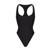 ICONIC SWIM RACERBACK ONE PIECE | OBSIDIAN FLAT ON A WHITE BACKGROUND | FLT