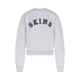 COTTON FLEECE LOGO CLASSIC CREWNECK | PLAID ARCHED LOGO PATCH FLAT ON A WHITE BACKGROUND | FLT