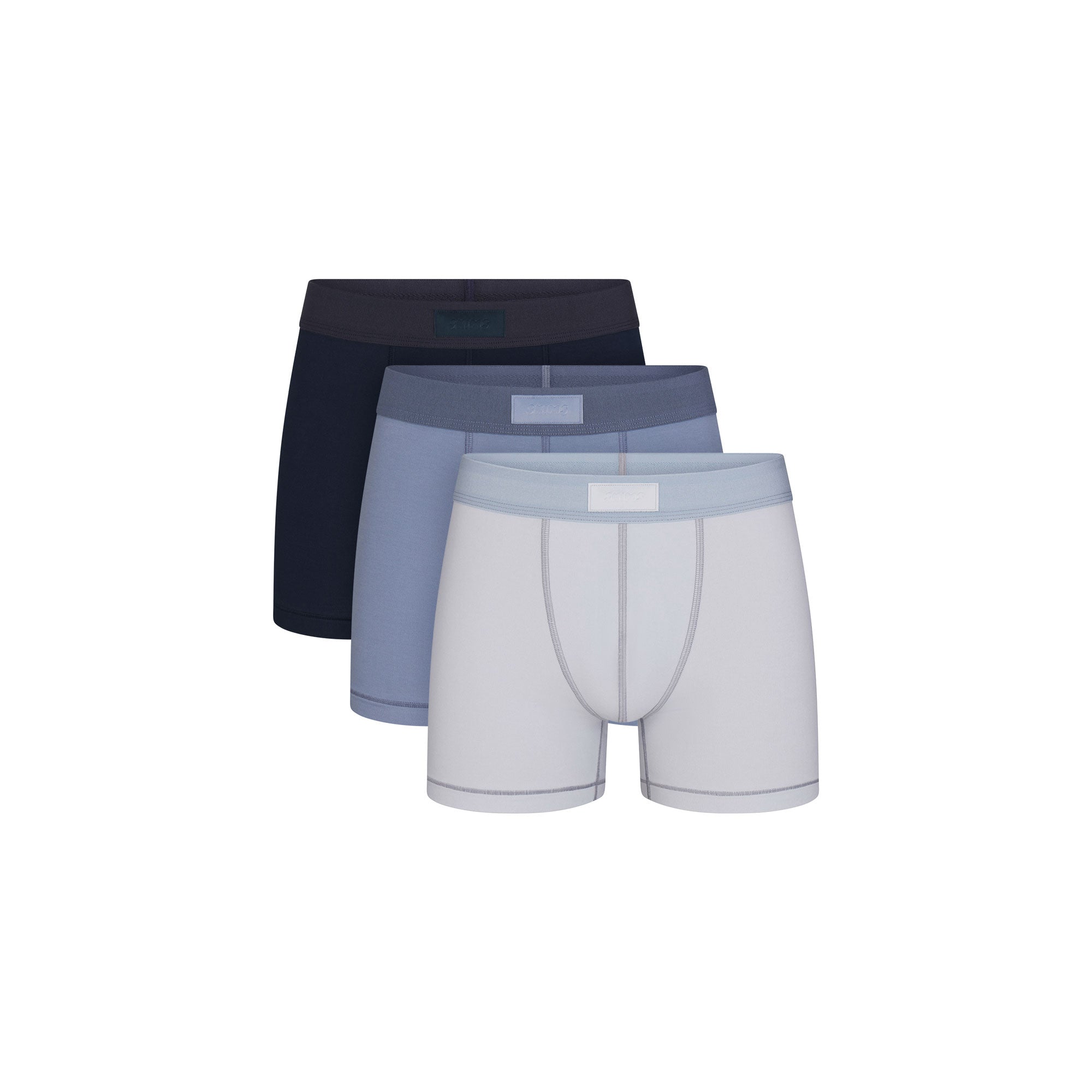 SKIMS COTTON MENS 3" BOXER BRIEF 3-PACK | NIMBUS MULTI FLAT ON A WHITE BACKGROUND | FLT @ | FOCUS: 0.0, 1.0, 0.9