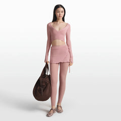NikeSKIMS STRETCH KNIT WRAP SKIRT | HIMALAYAN ON A MODEL FRONT VIEW @ | FOCUS: 0.0, 1.0, 0.9