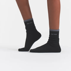 RIBBED CREW LOGO SOCK | ONYX AND DARK HEATHER GREY ON A MODEL | FOCUS: 0.0, 1.0, 0.9