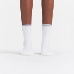RIBBED QUARTER CREW LOGO SOCK | SNOW AND LIGHT HEATHER GREY ON A MODEL | FOCUS: 0.0, 1.0, 0.9