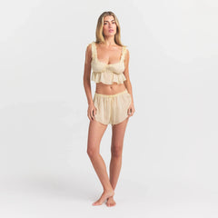 SKIMS ROMANCE BABYDOLL AND SHORT SET | BUTTER ON A MODEL FRONT VIEW @ | FOCUS: 0.0, 1.0, 0.9