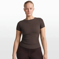 NikeSKIMS RIBBED SEAMLESS BABY TEE | PHOENIX/TRUFFLE ON A MODEL FRONT VIEW @ | FOCUS: 0.0, 1.0, 0.9