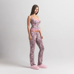 SKIMS SLEEP CAMI AND PANT SET | BLOOM MINI MULTI ANIMAL ON A MODEL SIDE VIEW @ | FOCUS: 0.0, 1.0, 0.9