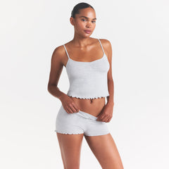 SKIMS SLEEP CAMI SET | LIGHT HEATHER GREY ON A MODEL SIDE VIEW @ | FOCUS: 0.0, 1.0, 0.9