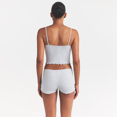SKIMS SLEEP CAMI SET | LIGHT HEATHER GREY ON A MODEL SIDE VIEW @ | FOCUS: 0.0, 1.0, 0.9