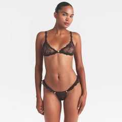 STRETCH LACE BUTTERFLY THONG | ESPRESSO ON A MODEL SIDE VIEW @ | FOCUS: 0.0, 1.0, 0.9