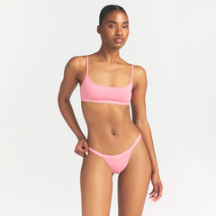 LIGHTWEIGHT COTTON LOGO PICOT THONG | MELON TONAL ON A MODEL SIDE VIEW @ | FOCUS: 0.0, 1.0, 0.9