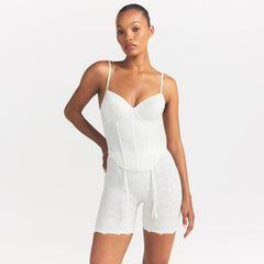LACE SHAPEWEAR CORSET | IVORY ON A MODEL SIDE VIEW @