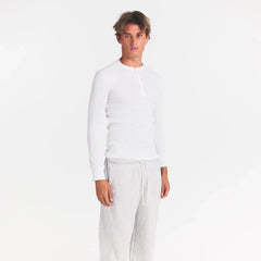 SKIMS COTTON RIB MENS HENLEY | CHALK ON A MODEL SIDE VIEW @ | FOCUS: 0.0, 1.0, 0.9